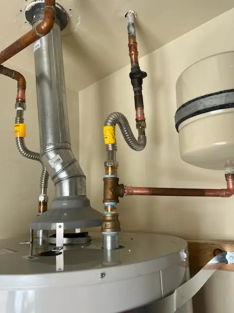 Water heater installation and plumbing repair in Mountain Lake Colony